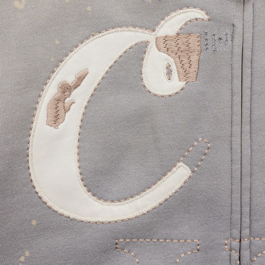 Gold Rush Distressed and Splattered Zip Front Hoodie